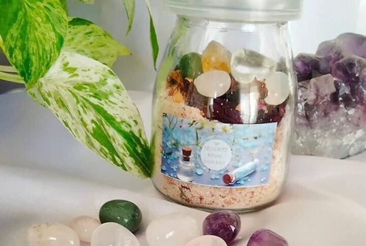 ritual bath salt with herbs and crystals used for energy cleansing chakra balance and full moon bath rituals